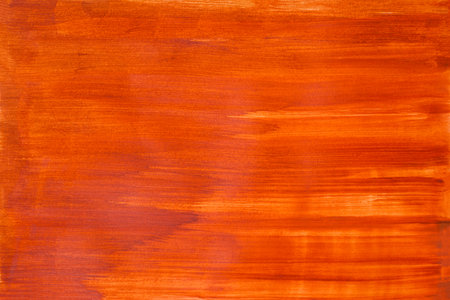 Orange painted wood texture. Abstract background with copy space for design.の写真素材