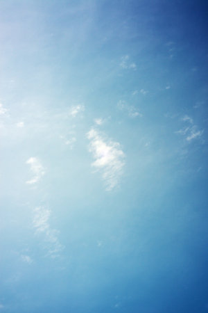 blue sky background with tiny clouds. blue sky background with tiny cloudsの写真素材
