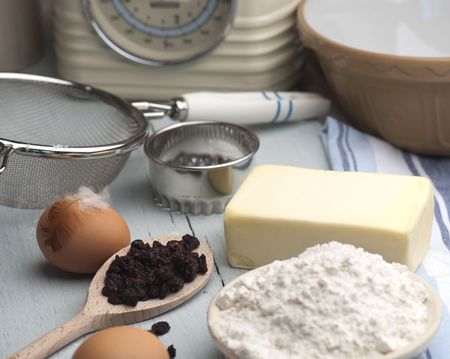 Baking Ingredients Laid Out On A Wooden Kitchen Tableの写真素材