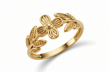 Gold flower ring features intricate leaf details a beautiful jewelry piece showcasing floral elegance and refined craftsmanship perfect as a gift or symbol of love.の写真素材