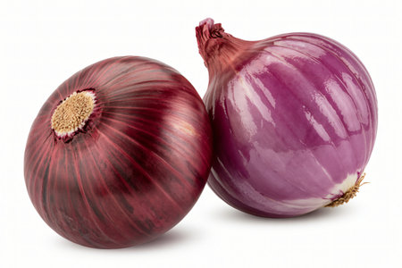 Red onions present a vibrant culinary image showcasing fresh produce ready for cooking adding flavor and color to dishes with their sharp taste and nutritional value.の写真素材
