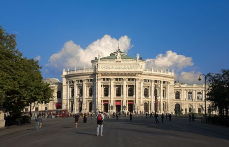 View of the "Burgtheater"  in Vienna, Austria against a blue sky.の写真素材