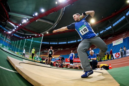 VIENNA, AUSTRIA - FEBRUARY 21: Indoor track and field championship: Christoph Seiser places sixth in the men's shot put event February 21, 2009 in Vienna, Austria.のeditorial素材