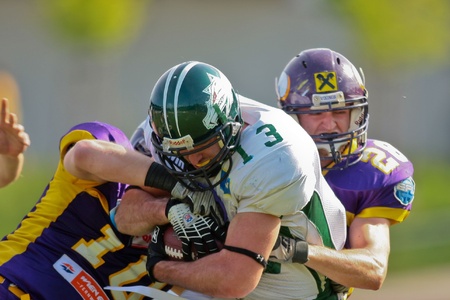 Vienna,  AUSTRIA - May 10: Austrian Football League:  WR Thomas Haider (#13, Dragons) and the Danube Dragons  beat the Vienna Vikings 24:27 on May 10, 2009 in Vienna, Austria.のeditorial素材
