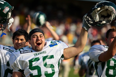Vienna,  AUSTRIA - May 10: Austrian Football League:  Karim Abdel-Rehem (#55, Dragons) and  the Danube Dragons  beat the Vienna Vikings 24:27 on May 10, 2009 in Vienna, Austria.のeditorial素材