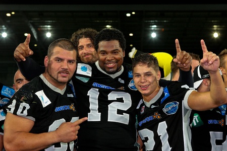 INNSBRUCK,  AUSTRIA - JULY 11 European Football League - Euro Bowl XXIII:  DL Timothy Hunt (#12, Raiders) and his team win 30:19 against Flash de la Courneuve on July 11, 2009 in Innsbruck, Austria.のeditorial素材