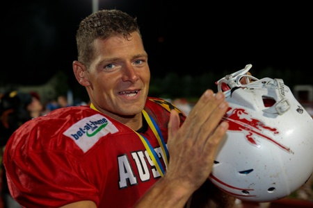 WOLFSBERG, AUSTRIA - AUGUST 22 American Football B-EC: QB Andreas Diwald (#11, Austria)  and his team celebrate the championship on August 22, 2009 in Wolfsberg, Austria.のeditorial素材