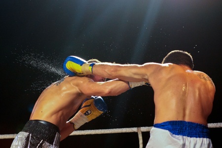 VIENNA, AUSTRIA - OCTOBER 3 Charity Boxing:  Gogi Knezevic (left, Austria) beats Joseph Sovijus (right, Slovakia) in a middleweight fight on October 3, 2009 in Vienna,  Austria.のeditorial素材