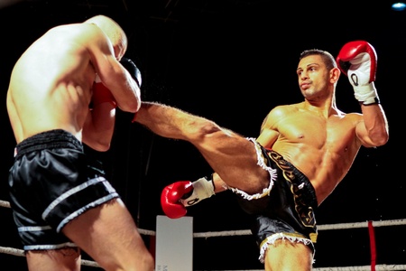 VIENNA, AUSTRIA - OCTOBER 3 Charity Boxing:  Sasa Jovanovic (right, Austria) beats Laszlo Simon (left, Hungary) in a K1 fight on October 3, 2009 in Vienna,  Austria.のeditorial素材