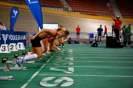 VIENNA,  AUSTRIA - FEBRUARY 2 Indoor track and field meeting. Elisabeth Plazotta (Austria, front) places 7th in the women's 60m hurdles race on February 2, 2010 in Vienna, Austria.のeditorial素材