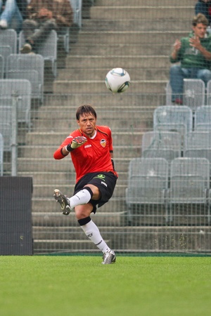 VIENNA,  AUSTRIA - JULY 26 Diego Alves Carreira (#1, Valencia) kicks the ball during the friendly soccer game on July 26, 2011 in Vienna, Austria. SK Rapid wins 4:1.のeditorial素材