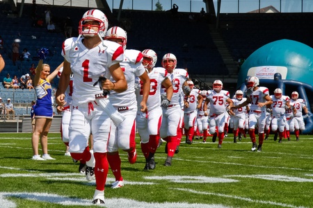 GRAZ, AUSTRIA - JULY 9 WR Noriaki Kinoshita (#1 Japan) leads his team on the field at the Football World Championship on July 9, 2011 in Graz, Austria. Japan wins 24:6 against Austria.のeditorial素材