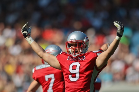 GRAZ, AUSTRIA - JULY 9 DB Peter Tutsch (#9 Austria) at the Football World Championship on July 9, 2011 in Graz, Austria. Japan wins 24:6 against Austria.のeditorial素材
