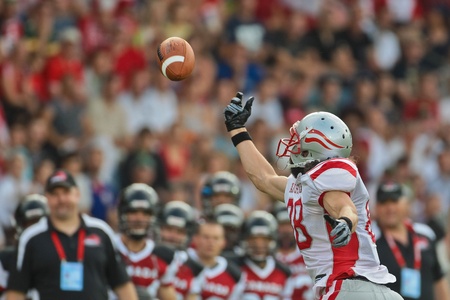 GRAZ, AUSTRIA - JULY 11 WR Andreas Pröller (#88 Austria) catches the ball at the Football World Championship on July 11, 2011 in Graz, Austria. Canada wins 36:14 against Austria.のeditorial素材