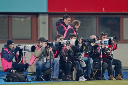 VIENNA, AUSTRIA - FEBRUARY 18 Photographers on the sideline during the soccer game on February 18, 2012 in Vienna, Austria. The game between Rapid and Austria ends 0:0.のeditorial素材