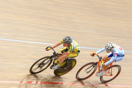 VIENNA,  AUSTRIA - SEPTEMBER 27  Lucie Zaleska (Czech Republic) and Alzbeta Pavlendova (Slovakia) compete in the women's scratch event of an indoor cycling meeting on September 27, 2012 in Vienna, Austria.のeditorial素材