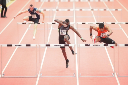 LINZ, AUSTRIA - JANUARY 31 Omo Osaghae (#212 USA) wins the men's 60m hurdles special event on January 31, 2013 in Linz, Austria.のeditorial素材