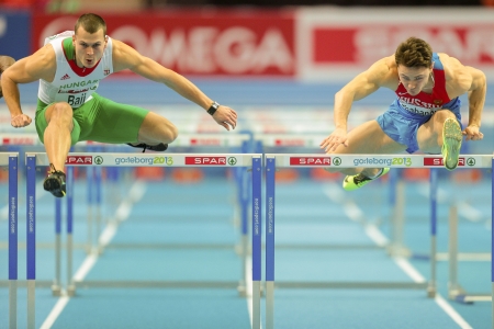 GOTHENBURG, SWEDEN - MARCH 1 Balazs Baji (Hungary) wins heat 2 of the qualification of the men's 60m hurdles event during the European Athletics Indoor Championship on March 1, 2013 in Gothenburg, Sweden.のeditorial素材