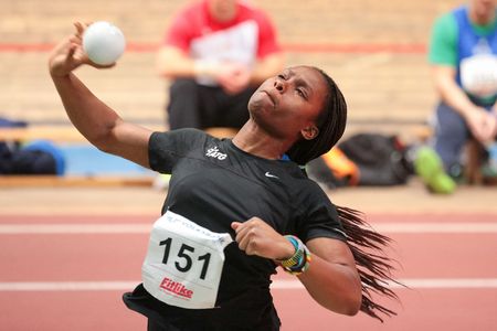 VIENNA, AUSTRIA - JANUARY 28, 2014: Djeneba Toure (#151 Austria) places 4th in women's shut put event in an indoor track and field meeting.のeditorial素材