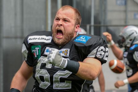 INNSBRUCK, AUSTRIA - MAY 3, 2014: OL Paul Lasch (#62 Raiders) celebrates a touchdown of his team.のeditorial素材