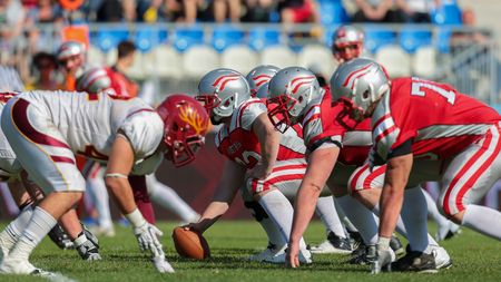 VIENNA, AUSTRIA - MAY 26, 2014: Team Austria face the Claremont McKenna Stags at the line of scrimmage.のeditorial素材