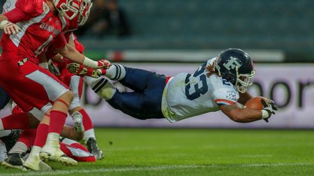 GRAZ, AUSTRIA - JUNE 2, 2014: RB Nguendjo Stephen Yepmo (#23 France) runs with the ball.のeditorial素材