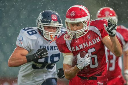 GRAZ, AUSTRIA - JUNE 2, 2014: RB Joachim Christian Hannesbo (#26 Denmark) runs with the ball.のeditorial素材