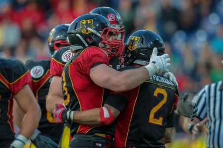 ST. POELTEN, AUSTRIA - JUNE 3, 2014: RB Danny Washington (#2 Germany) celebrates a touchdown.のeditorial素材