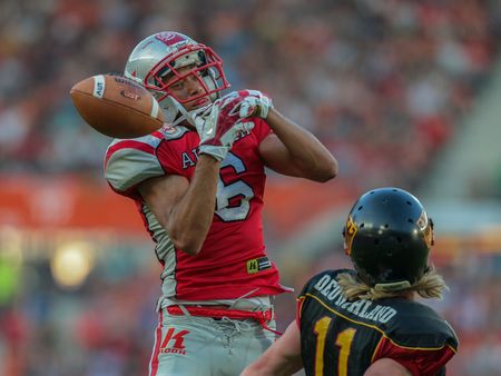 VIENNA, AUSTRIA - JUNE 7, 2014: WR Laurinho Walch (#6 Austria) fails to catch the ball.のeditorial素材
