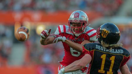 VIENNA, AUSTRIA - JUNE 7, 2014: WR Laurinho Walch (#6 Austria) fails to catch the ball.のeditorial素材