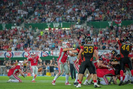VIENNA, AUSTRIA - JUNE 7, 2014: K Christopher Kappel (#2 Austria) kicks a PAT.のeditorial素材