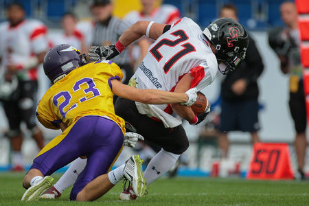 ST. POELTEN, AUSTRIA - JULY 26, 2014: DB Kevin Di Pippo (#21 Lions) intercepts the ball during Silver Bowl XVII.のeditorial素材