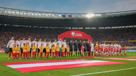 VIENNA, AUSTRIA - OCTOBER 12, 2014: The teams of Austria  and Montenegro pose before the game against Austria in an European Championship qualifying game.のeditorial素材