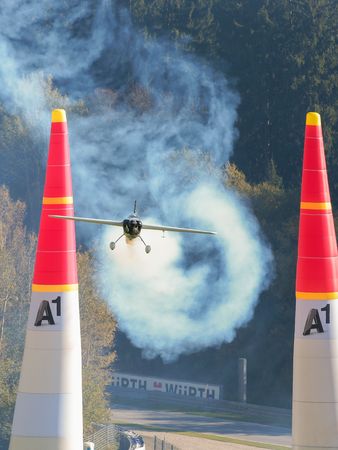 SPIELBERG, AUSTRIA - OCTOBER 25, 2014: Michael Goulian (USA) competes in the Red Bull Air Race.のeditorial素材