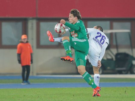 VIENNA, AUSTRIA - OCTOBER 28, 2015: Stefan Schwab (SCR) and Leonard Kaufmann (SBG) fight for the ball in an Austrian Football Cup game.のeditorial素材