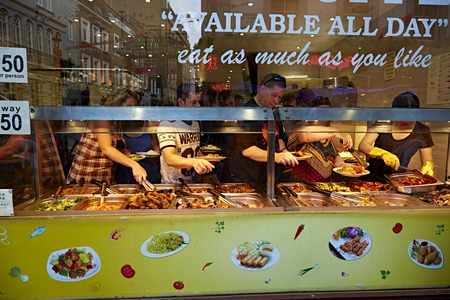 hungry people at an asian fast food restaurantのeditorial素材