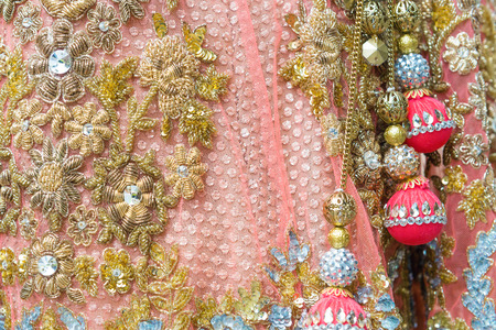 Indian embroidery on the dress, selective focusの写真素材