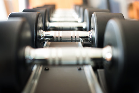 Dumbbell in fitness club