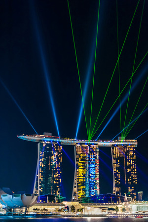 SINGAPORE - JULY 5 : Nightscape of Singapore Marina Bay Sand on July 5, 2012, Singapore. Marina Bay Sands is an Integrated Resort fronting Marina Bay in Singapore. It is billed as the world's most expensive standalone casino property at S$8 billionのeditorial素材