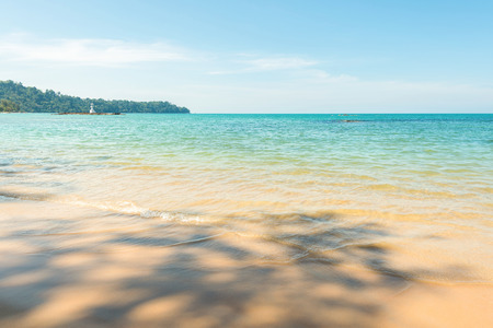 Seascape, beach, sea and lighthouse seeing from beach.の写真素材