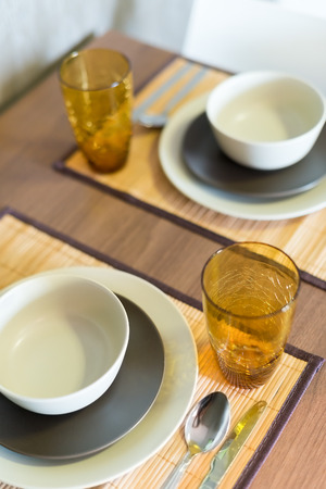 House decoration, dining table decorate with dining set on wooden table.の写真素材