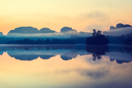 Beautiful sunrise and reflections at natural lagoon, Nongtalay lagoon in Krabi Province, Thailand.の写真素材