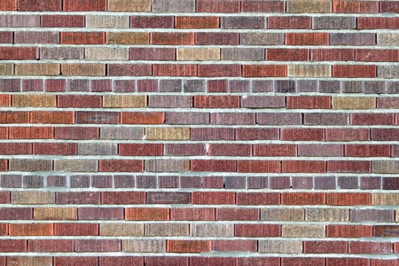 Vibrant multi color red brick wall pattern の写真素材