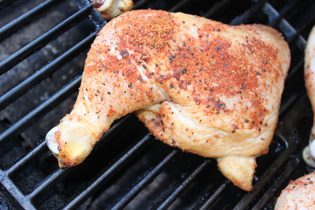 Close up of BBQ chicken with spice on it.の写真素材