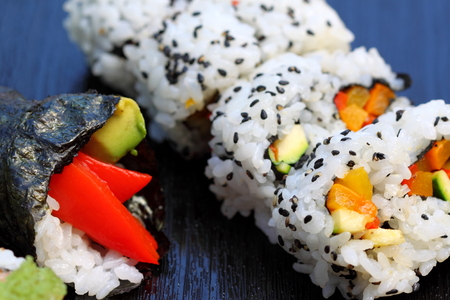 California sushi roll platted on a black plate.の写真素材