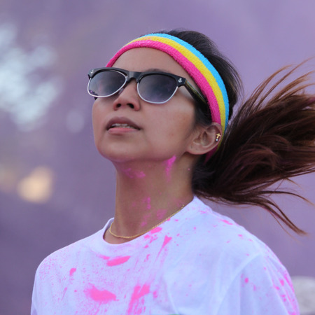 Ventura, CA - OCTOBER 18 :  Participants coming through the pink color station at The Color Run 2014...