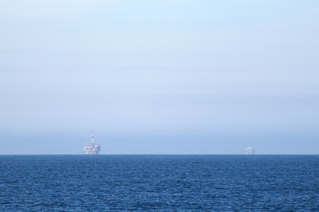 Two oil rigs in front of the Ventura coast.の写真素材