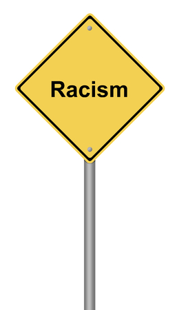 Yellow warning sign with the text Racism.の写真素材