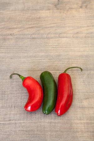 Jalapeno Peppers on Antiqued Butcher Block Cutting Boardの写真素材