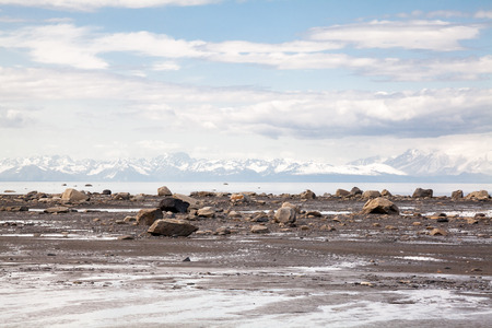 Rocky Beach and Distant Mountains